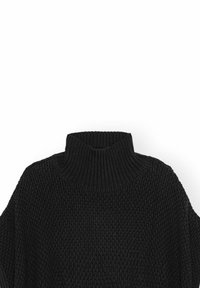 Svart stickad polotröja med ett strukturerat mönster och ribbad krage. Vid, avslappnad passform med korta ärmar.