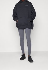 Under Armour Felpa con cappuccio - black