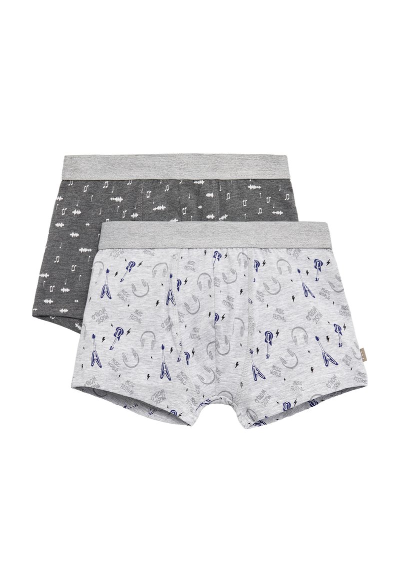 Dos pares de calzoncillos para niños: uno gris con notas musicales blancas, el otro gris claro con motivos musicales azules y relámpagos.