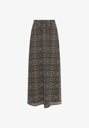 Jupe longue avec des motifs floraux et géométriques en noir, blanc et marron, dotée d'une ceinture élastique pour une coupe décontractée.