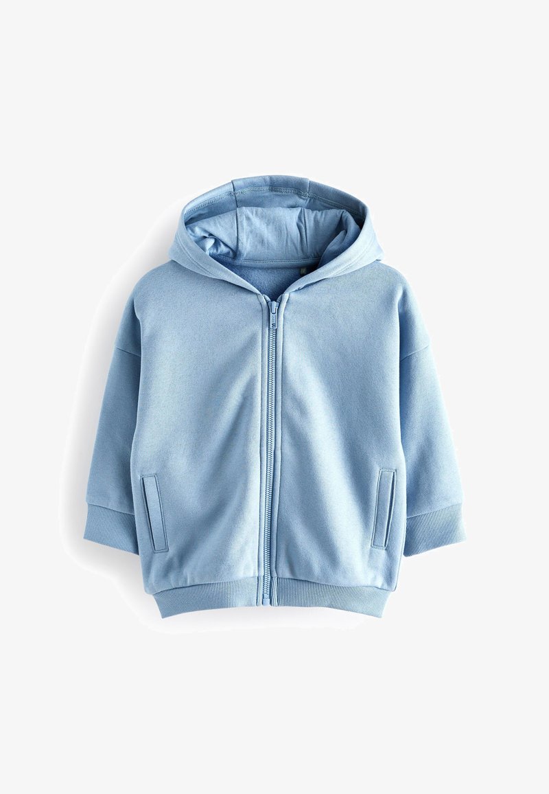 Veste à capuche zippée bleu clair en tissu doux, dotée d'une grande capuche, de poignet côtelés et de deux poches latérales. Texture lisse avec un design décontracté.