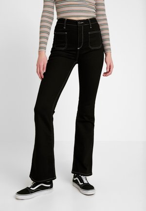 Vaqueros a campana - black