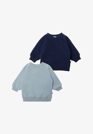 Two sweatshirts displayed: one navy blue and one light blue, both made of soft fabric with raglan sleeves and ribbed cuffs and hems.