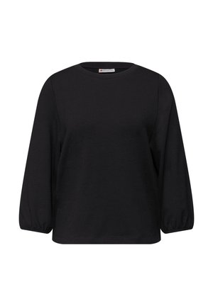 Mustanvärinen pitkähiha-paita, pehmeää kangasta. Pyöreä kaula-aukko, rento istuvuus ja liehuvat hihat, joissa on kerätyt kalvosimet. Yksinkertainen ja monipuolinen malli.