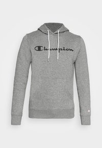 Felpa grigia con cappuccio, cordini regolabili, tasca a marsupio e logo "Champion" nero sulla parte anteriore. Tessuto morbido e vestibilità casual.