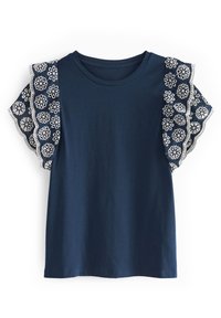 Navy blue short-sleeve top with white embroidered floral lace flutter sleeves and round neckline on a white background.