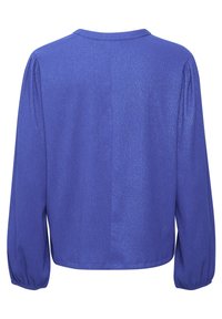 Blusa blu a maniche lunghe con scollo tondo. Realizzata in un tessuto testurizzato con una leggera lucentezza e dettagli arricciati nei polsini.