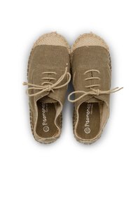 Linen espadrilles with a beige color, featuring a woven rope sole, lace closure, and textured fabric upper.