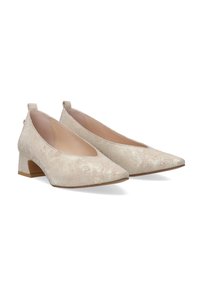 Beige, textured low-heeled shoes with a pointed toe and a V-shaped cutout. Includes a small heel and a pull tab at the back.