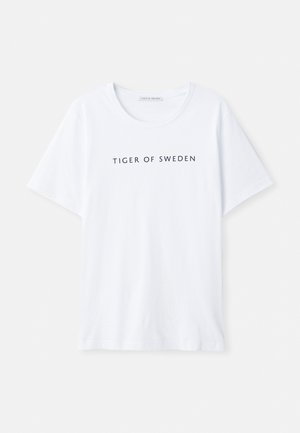White t-shirt with a round neckline and short sleeves. Black text reads "TIGER OF SWEDEN" centered on the front. Smooth fabric texture.
