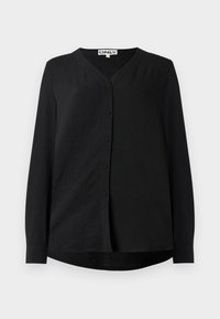 Chemise noire à manches longues avec des boutons, col en V, tissu texturé, ourlet arrondi et petits boutons assortis sur le devant.