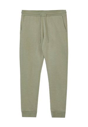 Jogging en coton kaki avec taille élastique, deux poches latérales et poignets fuselés, présentant une texture lisse et un design simple.