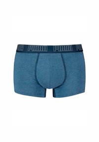 Boxer da uomo blu Puma con elastico a contrasto di colore navy. Presentano una vestibilità aderente, una texture morbida e una tasca frontale per il supporto.