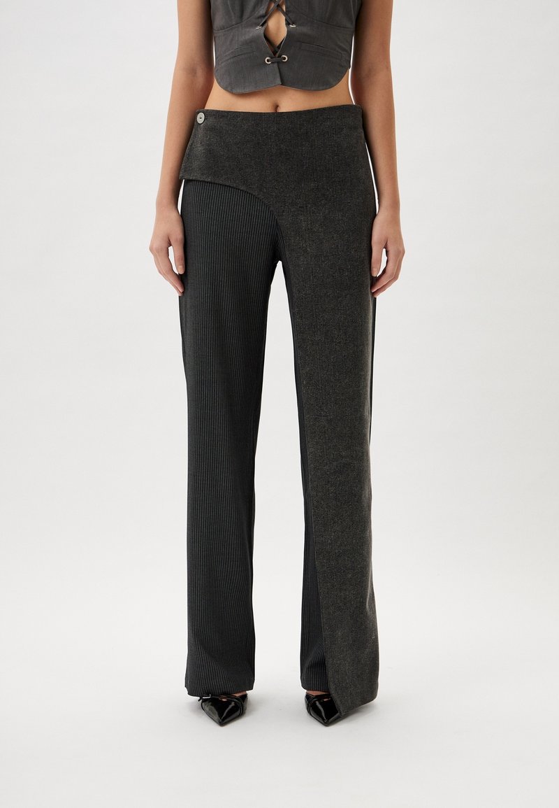 Dark gray high-waisted pants with a ribbed texture and side panel. Features a front button and straight leg design.