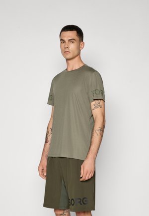 Olive green crew neck t-shirt with short sleeves, featuring "FORG" printed on the left sleeve. Paired with matching shorts showing "BORG" print.