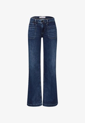 Mørkeblå denim flared jeans med mid-rise talje, fem lommer og kontraststing. Stoffet har en glat tekstur.