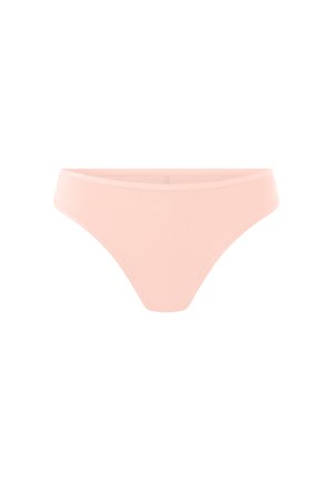 Sous-vêtement féminin style bikini rose clair avec bords sans couture, présenté sur fond blanc.