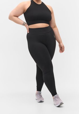 Leggings - Byxor - black