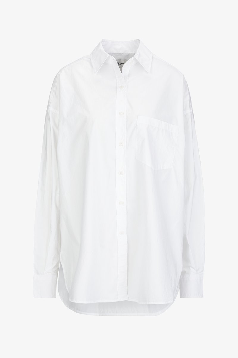 White long-sleeve button-up shirt made of cotton, featuring a classic collar, a single chest pocket, and a relaxed fit with a rounded hem.