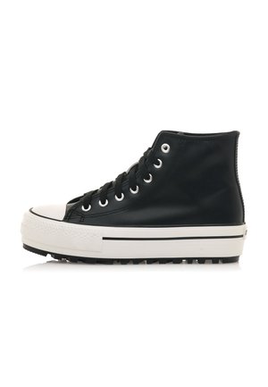 Black high-top sneaker with white rubber sole and toe cap, black laces, and metal eyelets, shown in side profile on a white background.