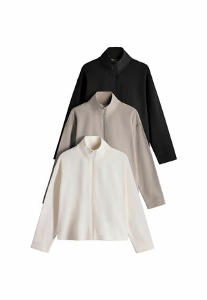 Three fleece jackets in black, gray, and white, each with long sleeves and front full-length zippers, shown layered on a white background.