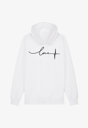 Balta kapuce ar kapuci, ar melnu kursīvu tekstu "mīlestība" un sirdsdarbības līniju virs tā. Mīksta auduma ar ribotiem piedurknēm un apakšmalu.