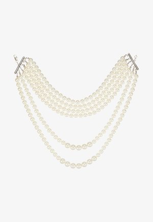 Collier multi-brins avec des perles blanches crémeuses de tailles différentes, maintenu par un fermoir en métal argenté simple et des accents.