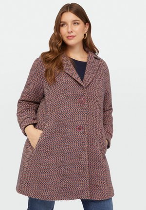 Woven coat in pink and purple houndstooth pattern, featuring a notched collar, two front pockets, and pink buttons.