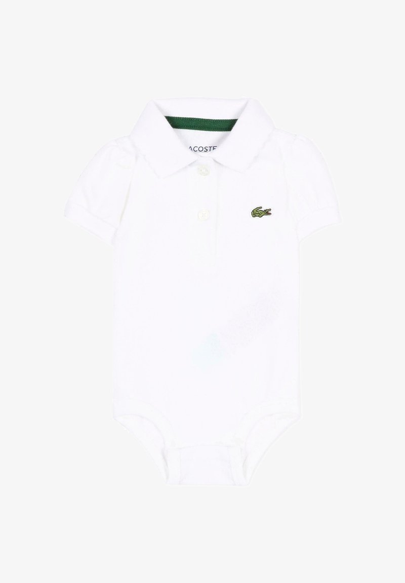 Body blanc à manches courtes pour bébé avec col, deux boutons, et logo de crocodile vert sur la poitrine.