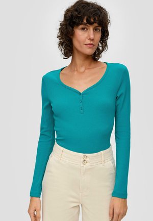 - Bluzka z długim rękawem