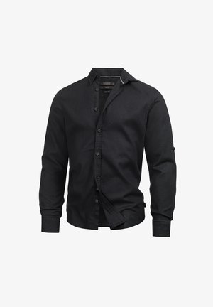 Schwarzes Langarmshirt aus einem Leinen-Mix. Mit einer knopffront, Kragen und Manschette mit einer subtilen Textur. Klassisches Schnittdesign.