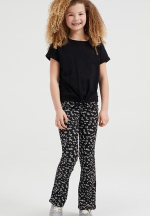 FLARED MET DESSIN - Leggings - Trousers - black