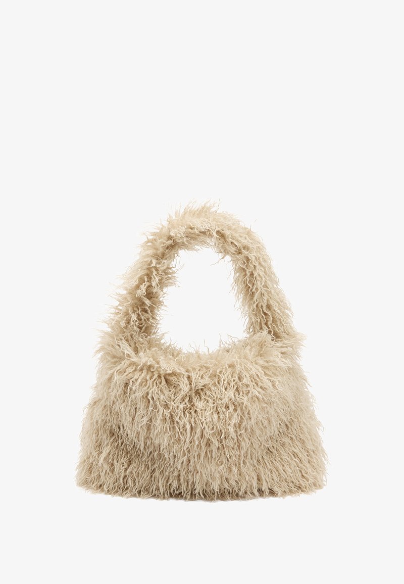 Beżowa torebka o puszystej fakturze, z miękką, teksturowaną powierzchnią, zaokrąglonym uchwytem oraz luźnym kształtem. Brak widocznych elementów metalowych lub akcentów.