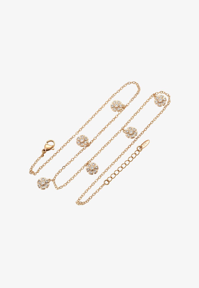 Collana in oro con ciondoli floreali e pietre trasparenti incastonate, texture liscia e chiusura a moschettone.