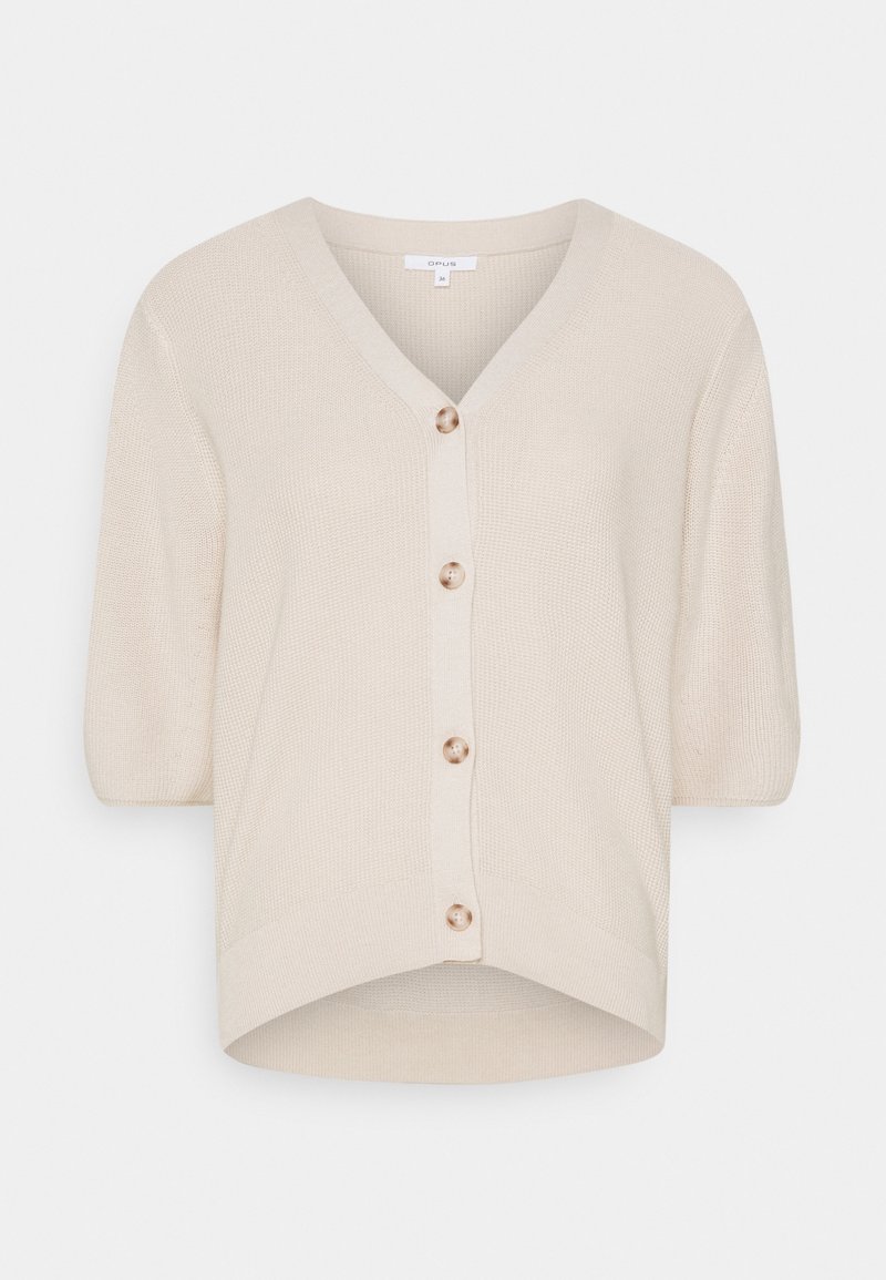 Cárdigan beige de punto con cuello en V, mangas cortas y cinco cierres de botones. La tela tiene un acabado texturizado y un dobladillo relajado.