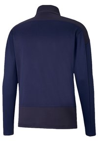 Giacca in pile a zip quarto di colore blu navy scuro, con maniche lunghe, tessuto strutturato e un giromanica e un orlo lisci a contrasto. La vista posteriore mostra dettagli minimi.