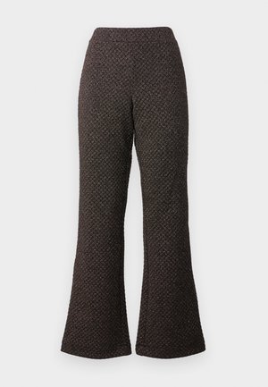 Flared black pants made of textured fabric with a patterned weave, featuring a high waistband and wide legs.