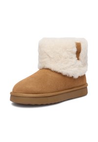 Hnedé semišové členkové topánky s krémovým kožúškom, plochou gumovou podrážkou a malou ozdobou na zadnej strane. Mäkká textúra a zaoblená špička.