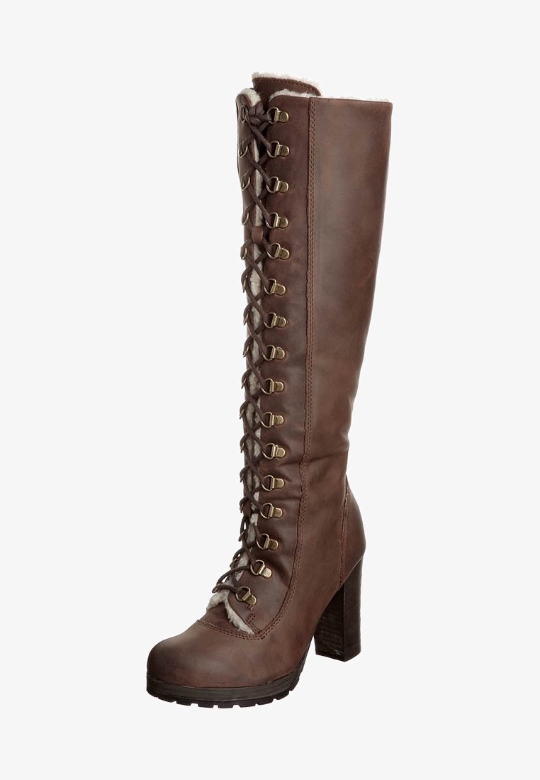 Braune Lederstiefel bis zum Knie mit Schnürung vorne, Metall-Ösen, einer strukturierten Sohle und einem klobigen Absatz. Fleece-Futter, das am oberen Rand sichtbar ist.