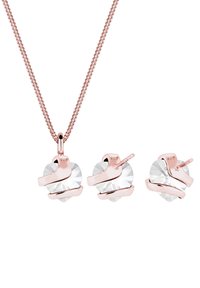 Roségulds halskæde og øreringe med klare, facetterede hjerteformede krystaller indhyllet i metalbånd. Kæden har et fint, sammenkoblet design.