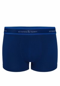 Granatowe bokserki z bawełny z kontrastującym pasem, na którym znajduje się napis "slopes & town" w jasnoniebieskim kolorze. Gładka textura i dopasowany krój.