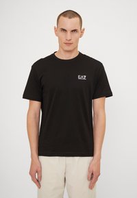 EA7 Emporio Armani Apdrukāts T-krekls - nero