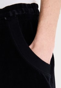 Jaded London MONSTER JOGGER - Spodnji deli trenirk - black