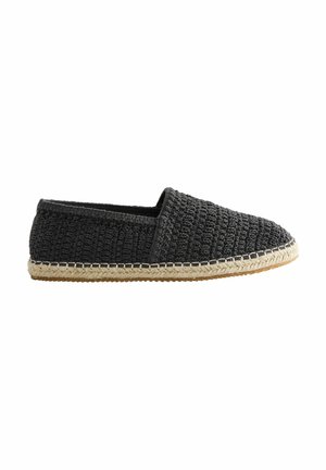 Schwarzer, gewebter Slipper mit einer strukturierten Oberseite, einer Espadrille-Jute-Sohle und einer gesteppten Kante. Leicht und lässiges Design.