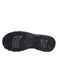Semelle extérieure en caoutchouc noir avec un motif de bande de roulement robuste, comportant des rainures et des points de traction pour une meilleure adhérence sur diverses surfaces.