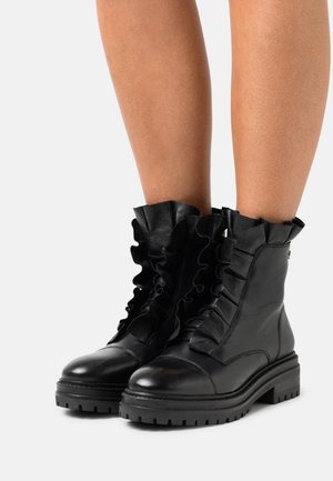 Copenhagen Shoes, Bottines à plateau - black