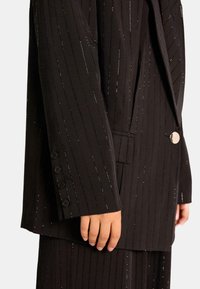 Alma en Pena Cappotto corto - black