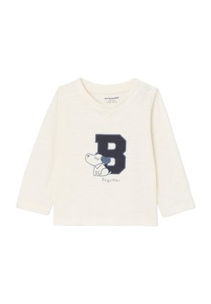 Helles langärmliges Baby-Shirt mit blauem "B" und einem Cartoon-Hund, beschriftet mit "Dogsitter". Druckknöpfe an der Schulter für einfaches Ankleiden.