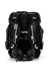 Black ergonomic backpack with lightning bolt design, padded straps, adjustable buckles, side pockets, and reflective accents for visibility.