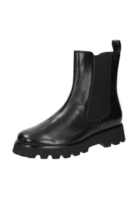 Botte de cheville en cuir noir avec semelle épaisse, panneau élastique sur le côté et languette à l'arrière pour un enfilage facile.